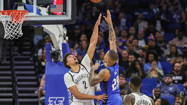 Orlando Magic guard Markelle Fultz (20) shoots the ball against Brooklyn Nets forward Cameron Johnson (2)